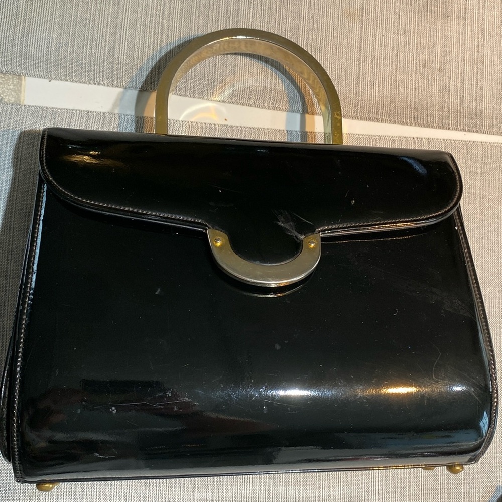 Never used. Vintage handbag. Black leather